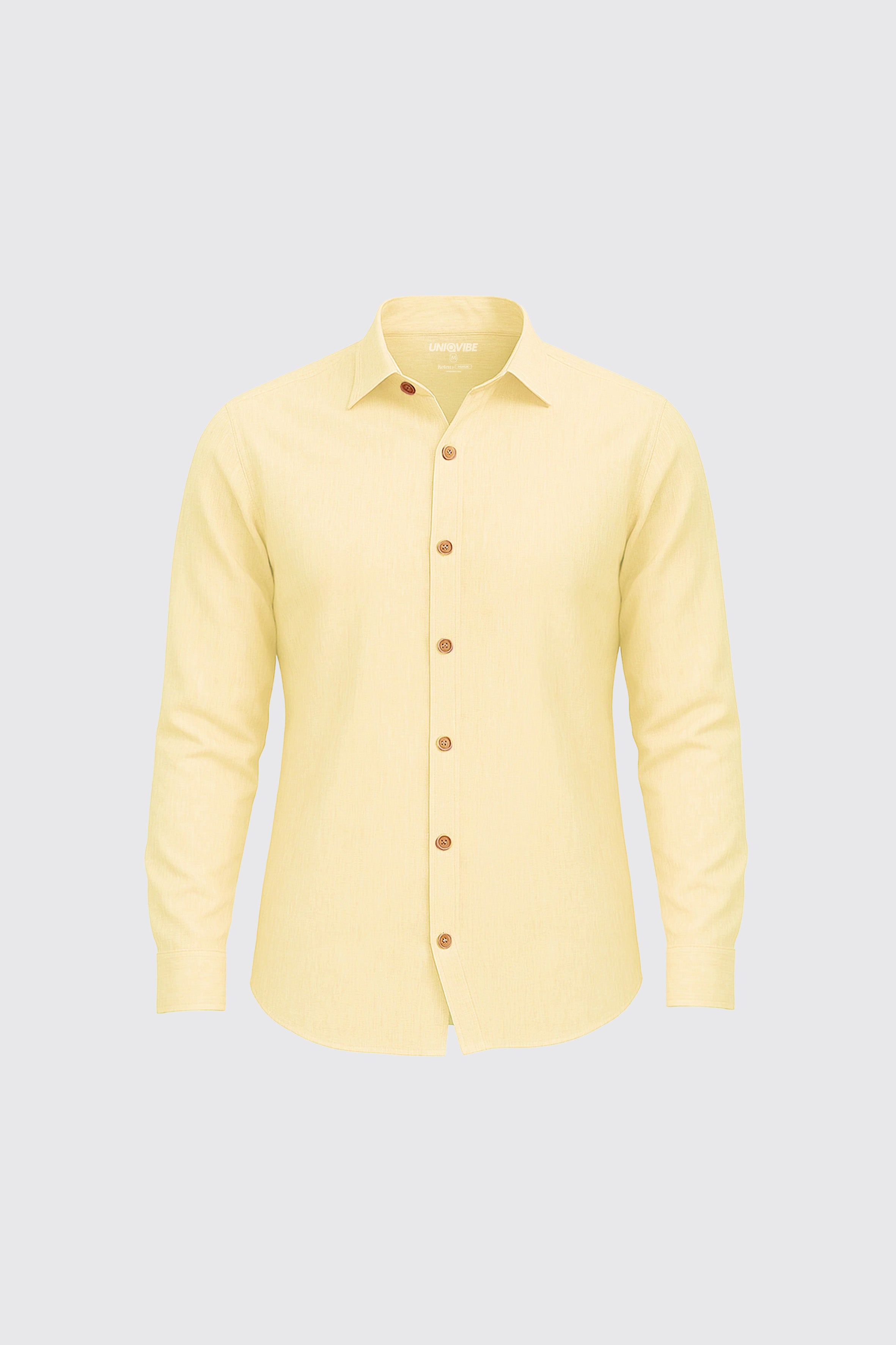 UNIQVIBE Sarı kadın keten gömlek, uzun kollu, düğmeli yaka detaylı, keten kumaştan üretilmiş şık ve modern bir tasarım. #Renk_Sarı