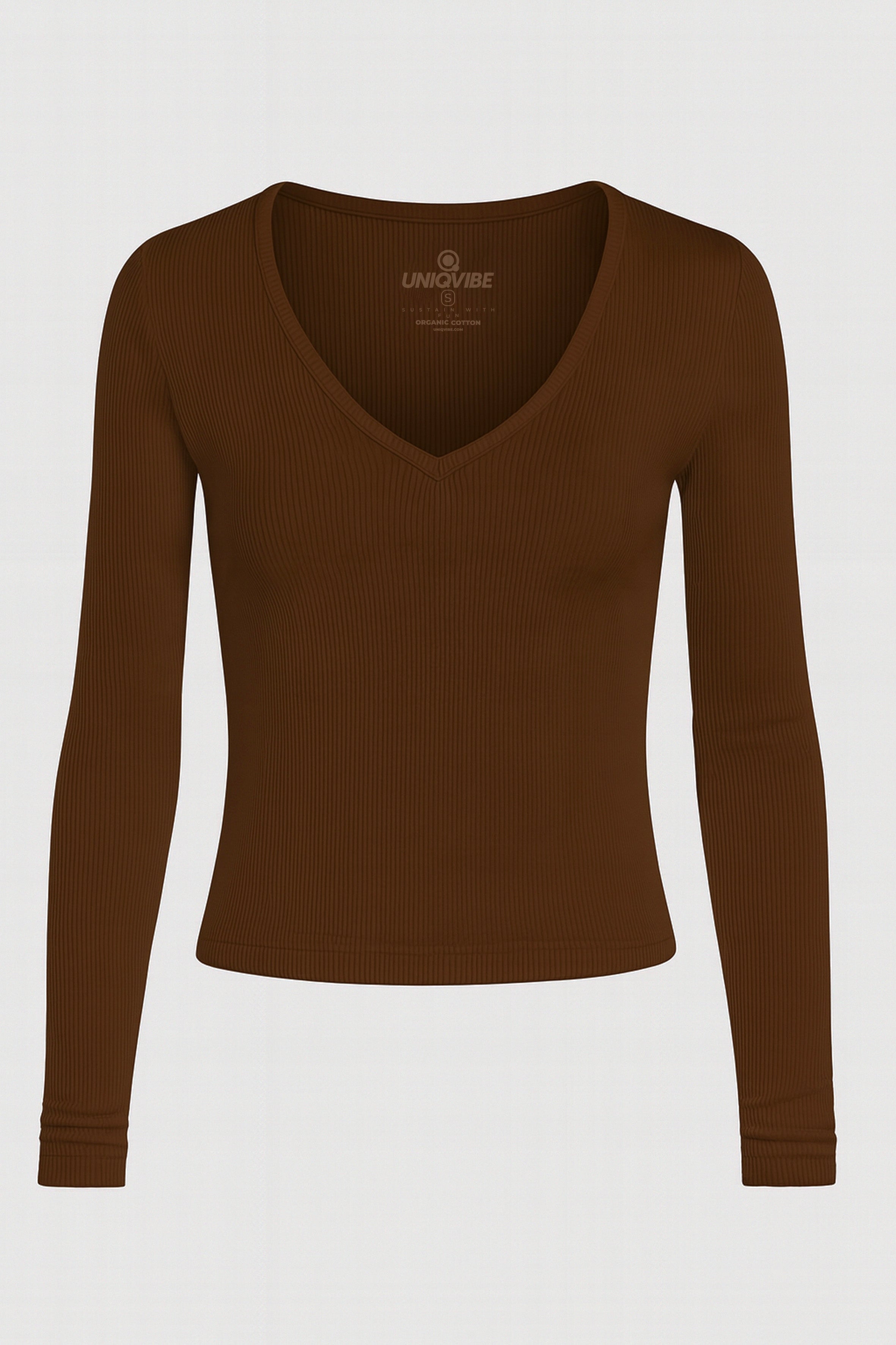 Organik pamuklu kahverengi fitilli uzun kollu bluz. Yumuşak dokulu kumaşı ve esnek fitilli formuyla vücuda uyum sağlar. V yaka detayıyla sade, modern bir görünüm sunar. Günlük stilin tamamlayıcısı olan bu parça, konforu ve şıklığı bir arada sunar.