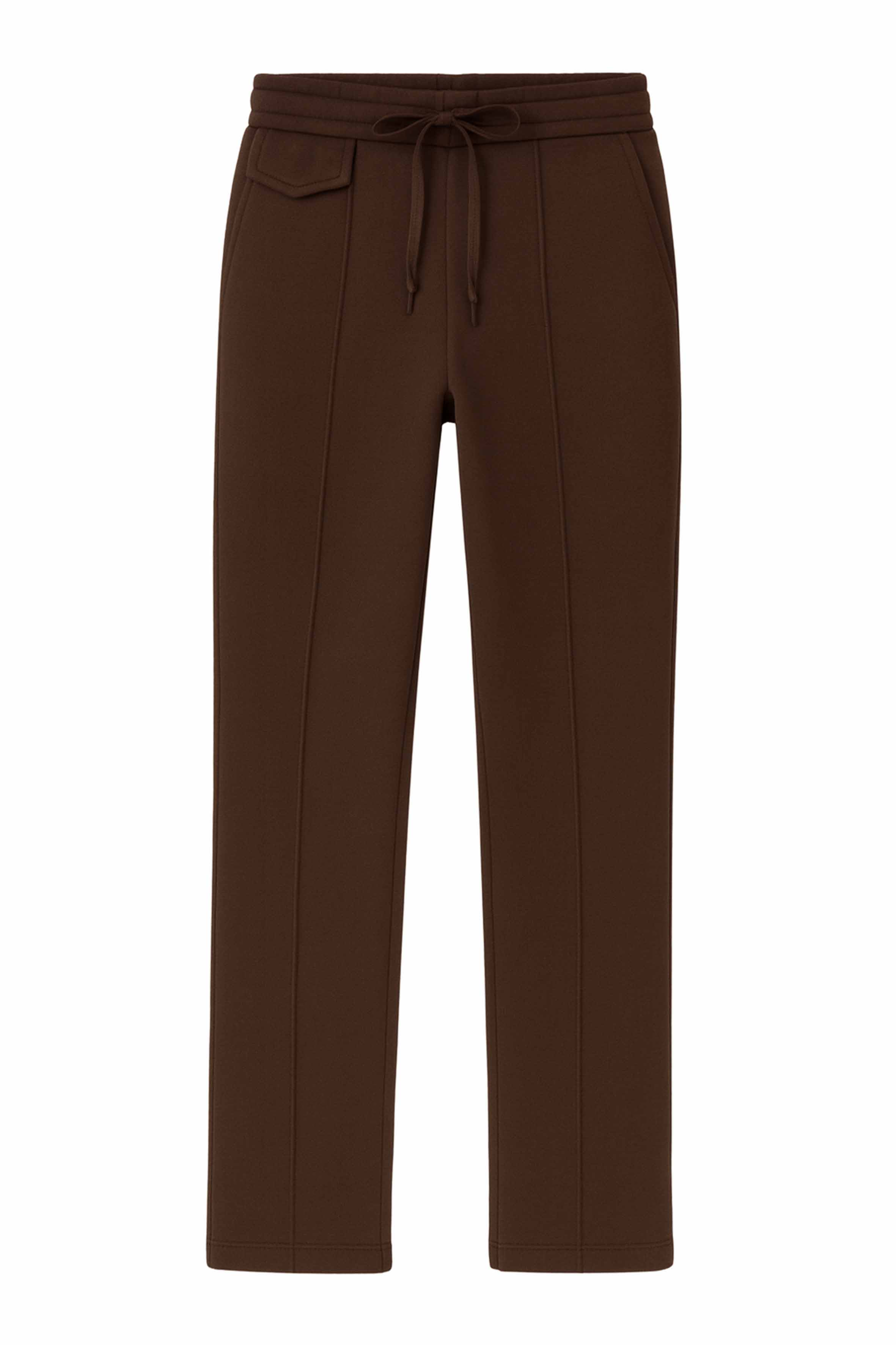 Rahatlık, stil ve sürdürülebilirlik bir arada! %100 organik pamuktan üretilen kahverengi kadın sweatpant, yumuşak dokusuyla gün boyu konfor sağlarken, modern kesimiyle her kombine uyum sağlar. Hem evde hem dışarıda özgürce hareket etmen için tasarlandı. 